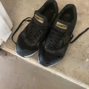 Unisex black & Gold sneakers sketchers